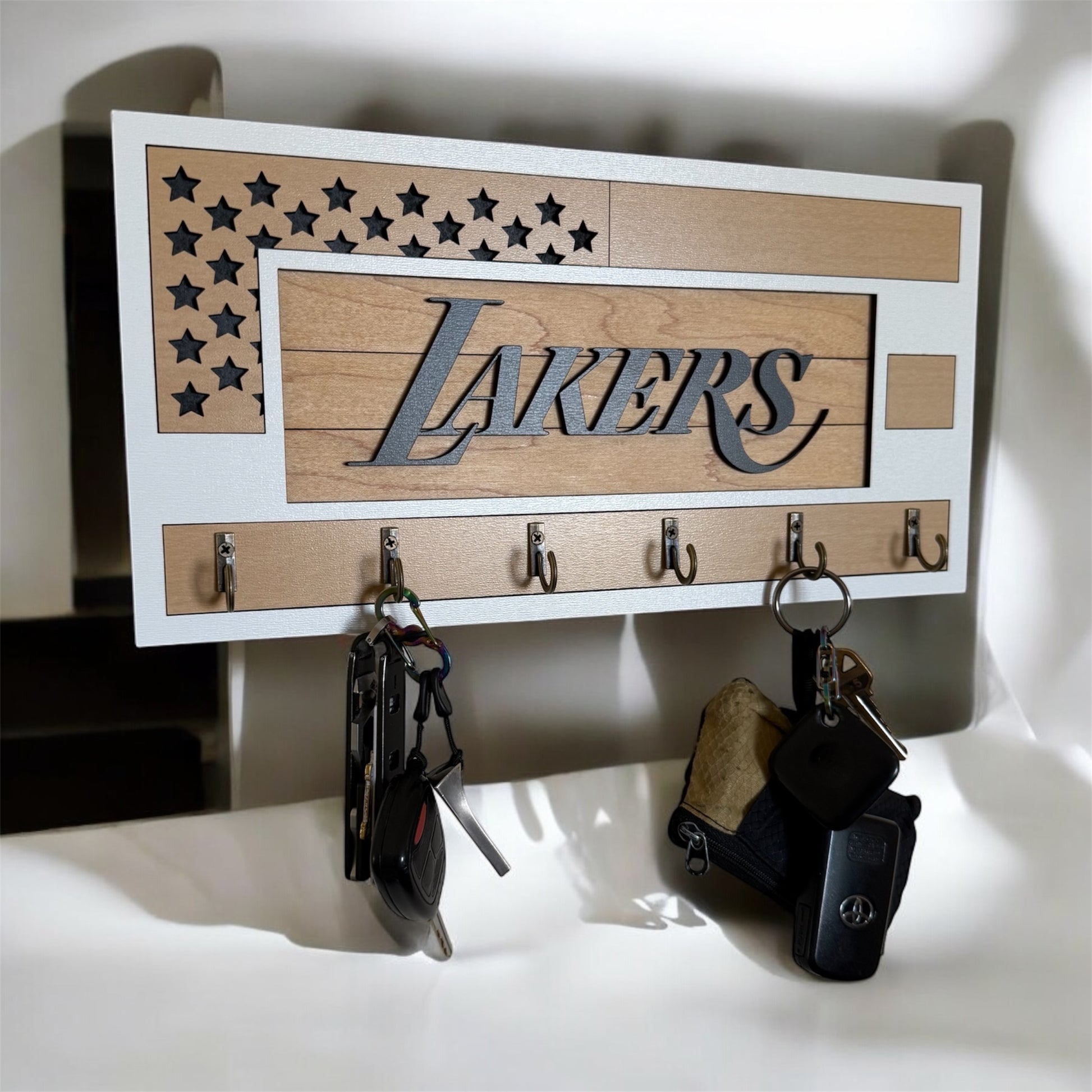 Black and wood grain Lakers key holder