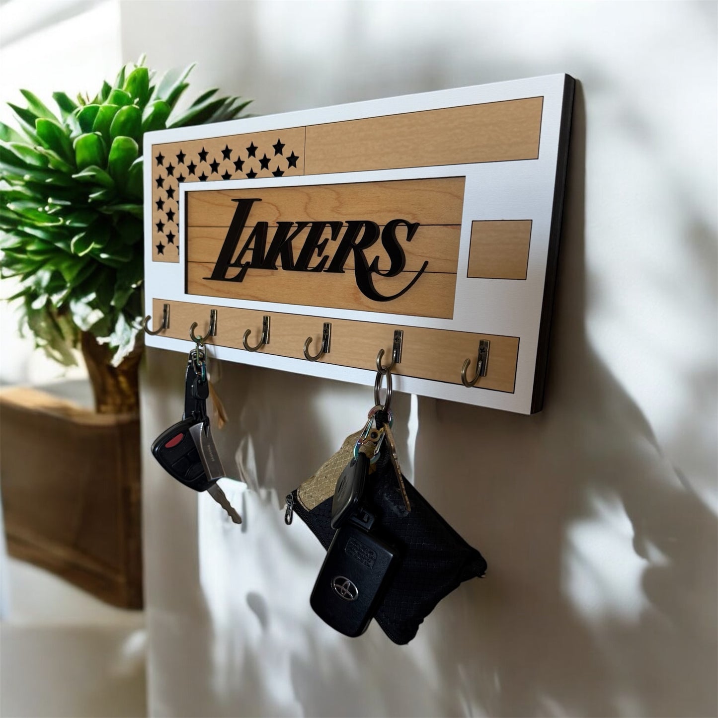 Black and wood grain Lakers key holder